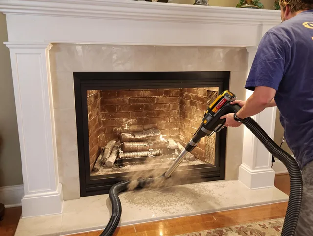 Fireplace cleaning performed by Uxbridge Chimney Sweep in Uxbridge, MA